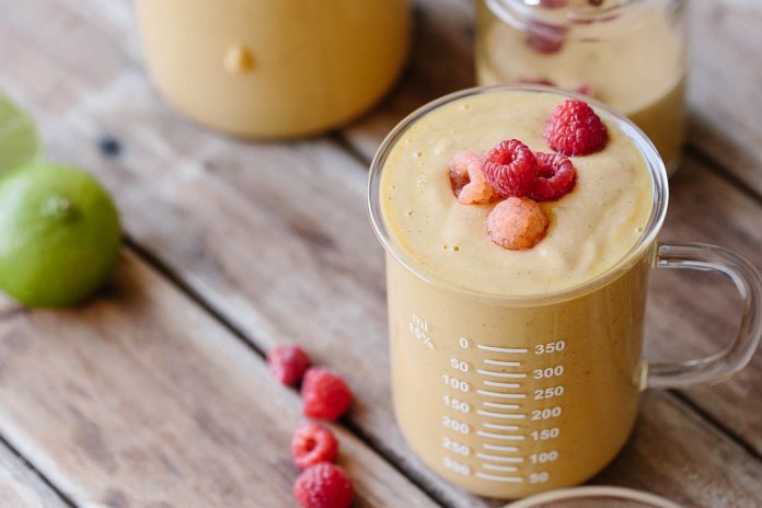 Mango & Raspberry Summer Smoothie with Turmeric & Lime in Australia